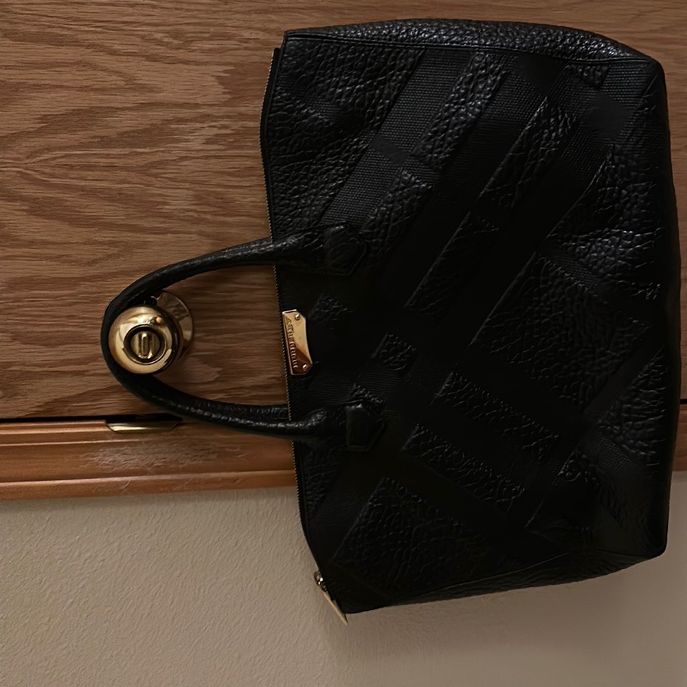 Gorgeous Burberry tote. A must see!